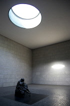 Germany, Berlin, Mitte, the Neue Wache, New Guardhouse, a memorial to victims of war and dictatorship on Unter den Linden with sculture by Kathe Kollwitz called Mother and Her Dead Son in isolation be...