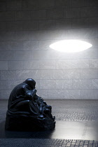 Germany, Berlin, Mitte, the Neue Wache, New Guardhouse, a memorial to victims of war and dictatorship on Unter den Linden with sculture by Kathe Kollwitz called Mother and Her Dead Son in isolation be...