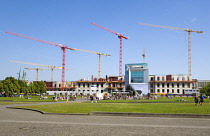 Germany, Berlin, Mitte skyline of tower cranes and buildings under construction on Museum Island beside Lustgarten.