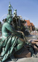 Germany, Berlin, Mitte, The Neptune Fountain or Neptunbrunner by Reinhold Begas dated 1891 with a female statue representing the Elbe one of the four main rivers of Prussia beside Marienkirche St Mary...