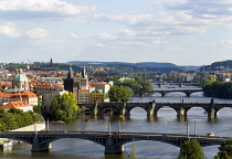 Czech Republic, Bohemia, Prague, View over the city showing the bridges across the River Vltava lined with medieval buildings.