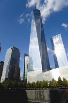 USA, New York, Lower Manhattan, One World Trade Center skyscraper, the tallest building in the city, and the South Memorial Pool.