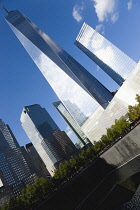 USA, New York, Lower Manhattan, One World Trade Center skyscraper, the tallest building in the city, and the South Memorial Pool.