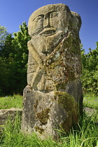 Ireland, County Fermanagh, Boa Island, Carved stone pagan figures that stand in Caldragh cemetery.