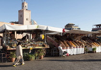 Morocco, Marrakech, Djemaa el Fna square, Early morning scene at open air market  with stalls selling tea and spices, as well as dried fruits and nuts.