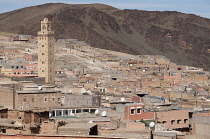 Morocco.Ourika Valley, Berber village in the foothills of the Atlas mountains with view of houses, mosque, and multiple satellite dishes.