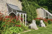 Ireland, County Westmeath, Castlepollard, Tullynally Castle Gardens, The Walled Garden with two sculptures of oxen.