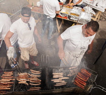 France, Normandy, Le Havre, A Barbecue stall in Seafood market.