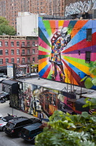 USA, New York, Manhattan, colourful mural by Brazilian street artist Kobra depicting the photograph by Alfred Eisenstaedt titled V-J Day in Times Square beside the High Line linear park on 25th Street.