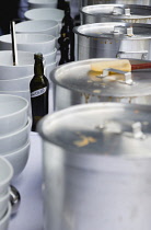 USA, New York, Manhattan, olive oil, bowls and cooking pots in readiness for a social soup experiment by Hearth Restaurant in the 14th Street Passage on the High Line linear park on an elevated disuse...