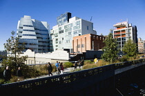 USA, New York, Manhattan, people walking among grasses in the Chelsea Grasslands on the High Line linear park on a disused elevated railroad spur called the West Side.