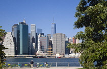 USA, New York, Lower Manhattan skyscraper skyline and East River seen from Brooklyn Bridge Park.