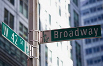 USA, New York, Manhattan, Road signs at the junction of Broadway and 42nd Street in the Theater District.