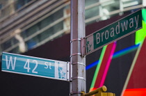 USA, New York, Manhattan, Road signs at the junction of Broadway and 42nd Street in the Theater District.