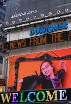USA, New York, Manhattan, Dow Jones TV video advertising and news screen on 42nd Street in Midtown Theater District.