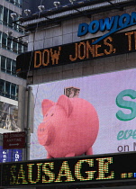 USA, New York, Manhattan, Dow Jones TV video advertising and news screen on 42nd Street in Midtown Theater District.