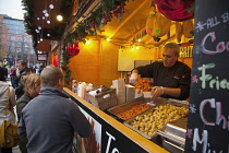 Ireland, North, Belfast, Christmas international food market in the grounds of the city hall.