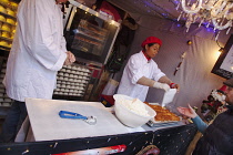 Ireland, North, Belfast, Christmas international food market in the grounds of the city hall.