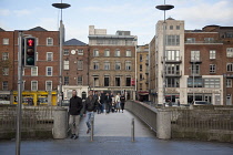 Ireland, Dublin, Footbridge across River Liffey viewed from the Temple Bar side.
