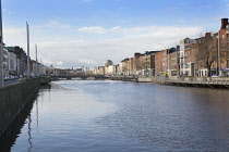 Ireland, Dublin, View along the River Liffey toward the Four Courts..