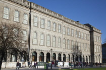 Ireland, Dublin, Trinity College buildings on College Green, Tourists queuing to enter the library to see the Book of Kells.