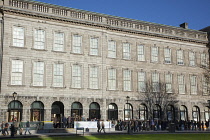 Ireland, Dublin, Trinity College buildings on College Green, Tourists queuing to enter the library to see the Book of Kells.