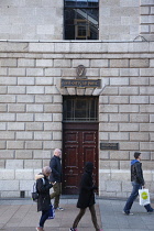 Ireland, Dublin, Side entrance to the GPO in Henry street with shoppers walking past.
