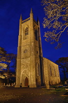 Ireland, County Sligo, Drumcliffe Church by night, the grave of the poet W B Yeats is located next to the church.