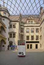 Germany, Saxony, Dresden, Residenzschloss or Royal Palace, Entrance hallway to its museums with canopy covering the area.