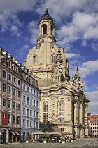 Germany, Saxony, Dresden, Frauenkirche or the Church of Our Lady in Neumarkt Square with tourists at outdoor restaurant.
