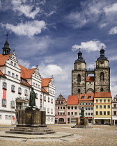 Germany, Saxony Anhalt, Lutherstadt Wittenberg, Marktplatz with the Rathaus and Pfarrkirche St Marien in the background, the Pfarrkirche St Marien is also known as Stadtkirche and St Marys.