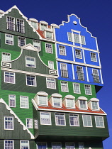 Netherlands, Noord Holland, Zaandam, Angular view of a section of the Inntel Hotel whose construction design is based on the  traditional house facades of the Zaan Region and featuring The Blue House...