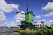 Netherlands, Noord Holland, Zaanse Schans village with restored windmills, De Gekroonde Poelenburg Windmill or the Crowned Poelenburg.