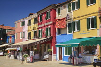 Italy, Veneto, Burano Island, Colourful row of house facades.