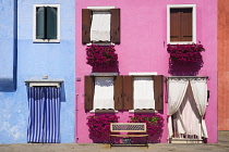 Italy, Veneto, Burano Island, Colourful house facades.