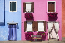 Italy, Veneto, Burano Island, Colourful house facades.