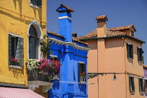 Italy, Veneto, Burano Island, Colourful housing facades on Fondamenta di Cavanella.