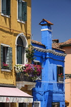 Italy, Veneto, Burano Island, Colourful housing facades on Fondamenta di Cavanella.