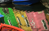 Italy, Veneto, Burano Island, Colourful reflections on Fondamenta di Cavanella.