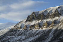 Norway, Svalbard, Longyearbyen valley side, Scree slopes, strata, snow, old coal mine.