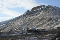 Norway, Svalbard, Longyearbyen, Svalbard Church, Kirke, remains of original settlement at Longyearbyen, remains of colliery aerial cable way along valley side.