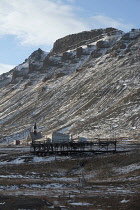 Norway, Svalbard, Longyearbyen.Svalbard Church, Kirke, remains of original settlement at Longyearbyen, remains of colliery aerial cable way along valley side.