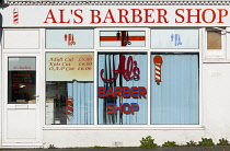 England, West Sussex, Bognor Regis, Al's Barber Shop front.