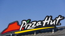 Markets, Food, Restaurants, Pizza Hut sign on the roof of a restaurant. **Editorial Use Only**