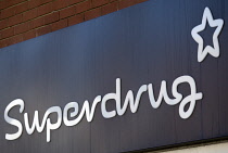 Business, Shops, Shopping, Superdrug sign on high street store facade. **Editorial Use Only**
