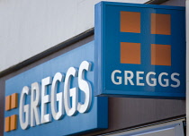 Business, Shops, Food, Greggs pie shop signs on a high street outlet. **Editorial Use Only**