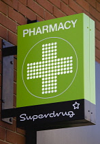 Business, Shops, Shopping, Superdrug Pharmacy sign on high street store. **Editorial Use Only**