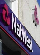 Business, Finance, Banking, Natwest signs and logo on a high street bank building.