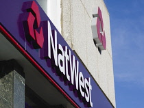 Business, Finance, Banking, Natwest signs and logo on a high street bank building.