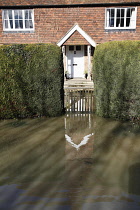 Climate, Weather, Flooding, House with flooded Garden, Headcorn, Kent, England.